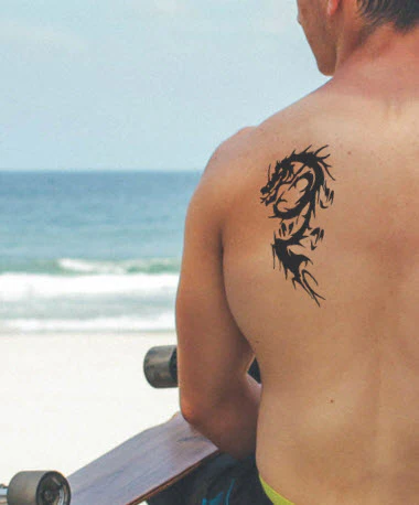 Black Tribal Dragon Large Tattoo - Image 2