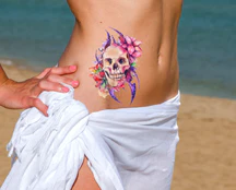 Girl & Skull Tattoos - Image 2
