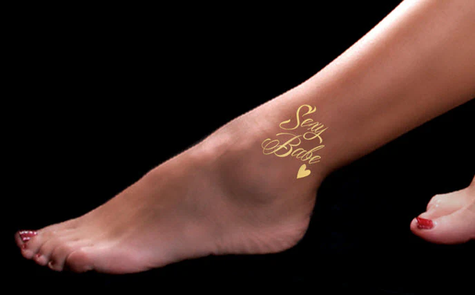 Sexy Babe Golden Heart Tattoo - Image 2