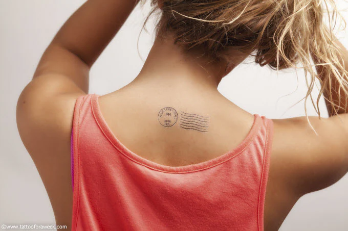 Stamp "Your Love Is All" Tattoo - Image 2