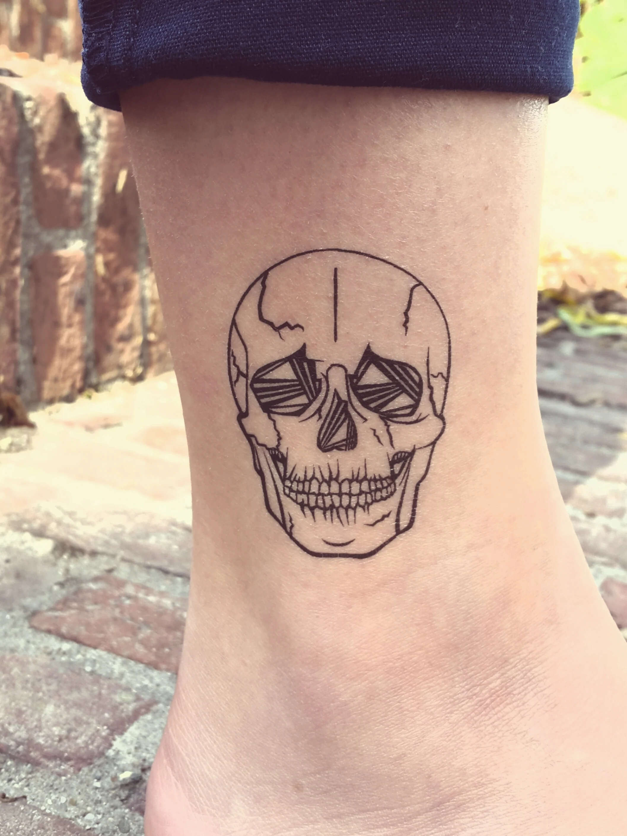 Strepik Skull Tattoo - Image 2